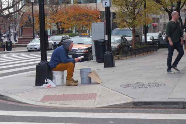 Homeless people and those looking for a handout frequent Connecticut Avenue.